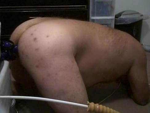 Man With Penis Pump And Dildo